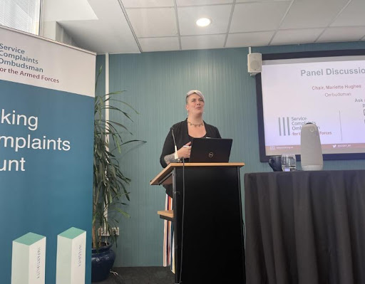 Woman speaking at a conference